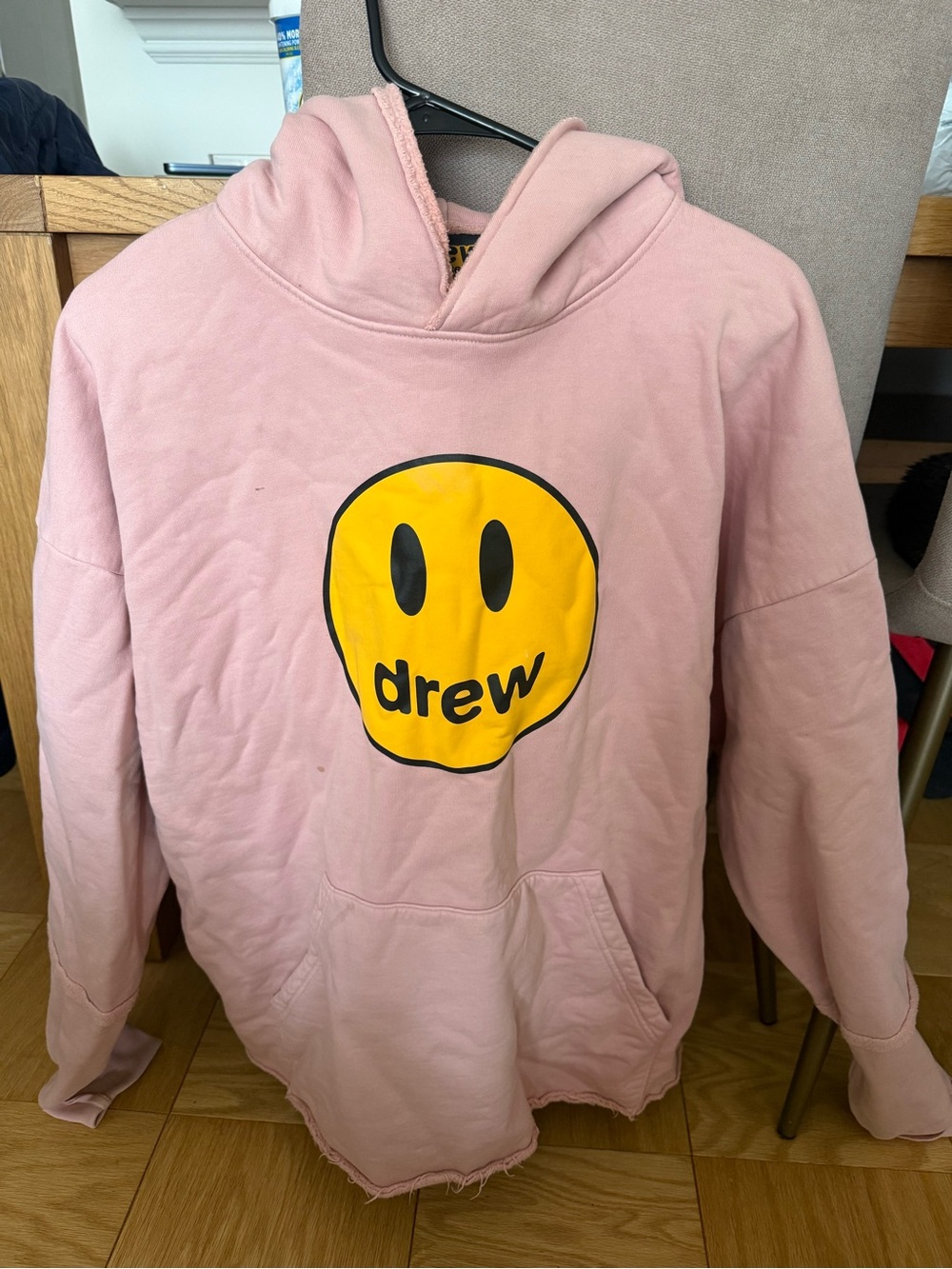 Drew House Pink Hoodie with Yellow Smile Logo